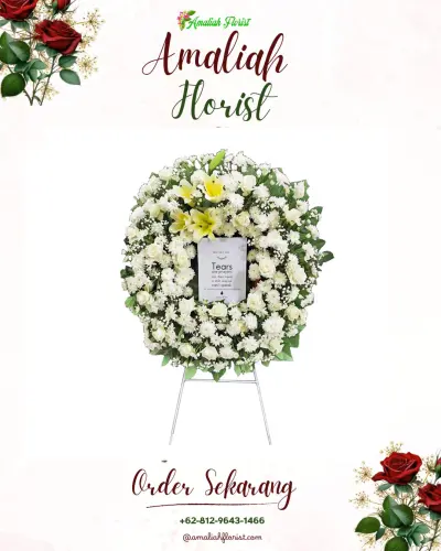 Krans Bunga Duka Cita di Tugu Kidul